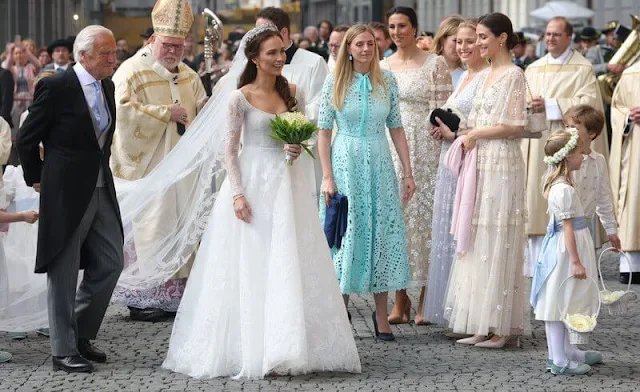 Princess Sophie-Alexandra wears a Bavaria diadem, and a wedding dress. Prince Alois and Princess Sophie