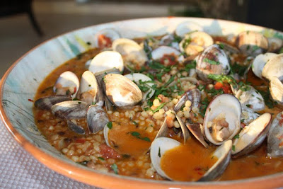 Fregola met schelpjes en tomatensaus