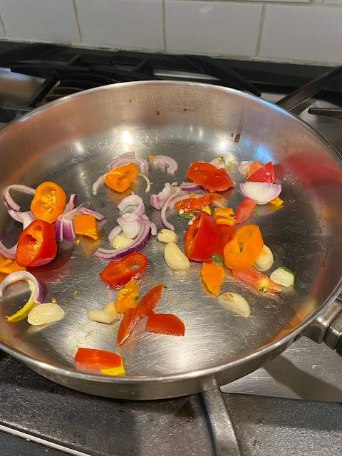 skillet with peppers and onions, vegan