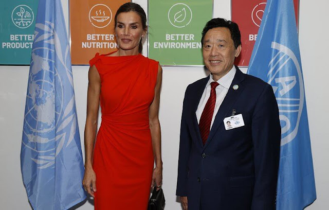 Queen Letizia wore a new red narciso rodriguez gathered midi dress by Zara. Executive Director Catherine Russell and Qu Dongyu