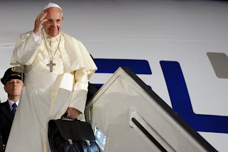 Pope on steps of plane