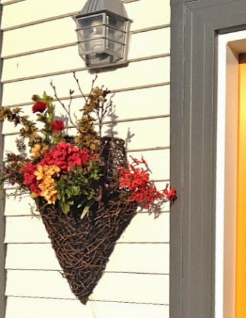 twig vase, red flowers, yellow flowers, Christmas