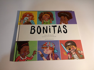 portada del cuento bonitas donde se ven niñas disfrazadas haciendo carotas