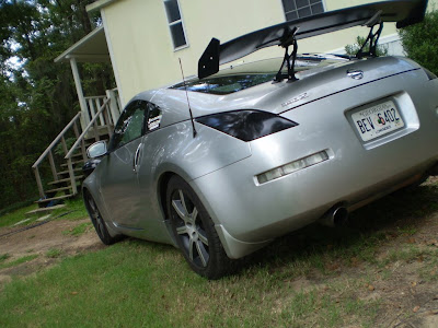 Pimped nissan 370z with a sick spoiler and tinted tail lights