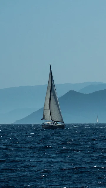 Boat In Sea Desktop And iPhone Wallpaper
