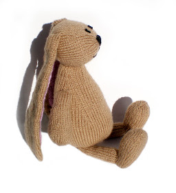 a fancy beige knitted plush bunny or rabbit called humboldt