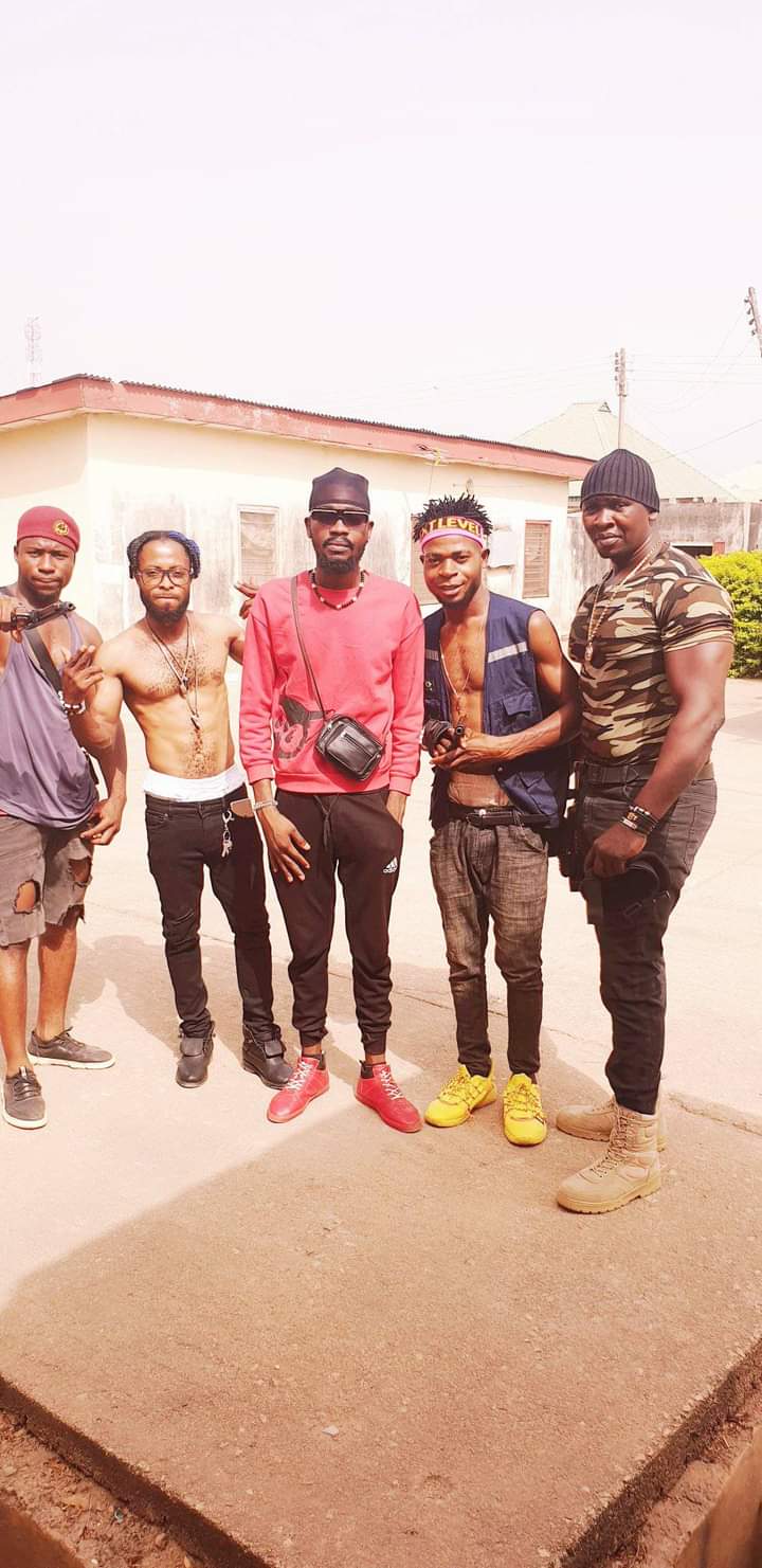 [E-news] Abuja based artist 'ASOLI ASP', Spotted with a gun, shooting video for 'MAN'