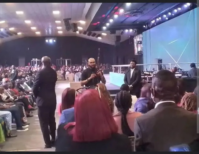 Abuja pastor brings AK 47 to altar