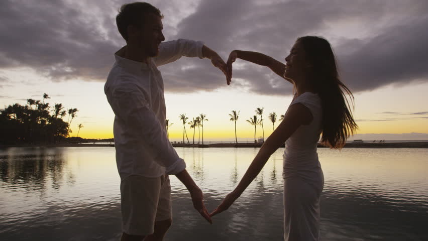 Romantic Love Couple Forming Heart Shape with Arms