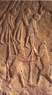 Assyrian relief menunjukkan hukuman "Impalement"