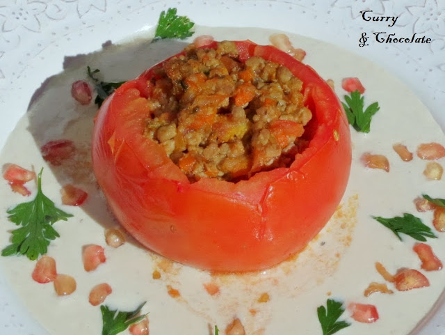 Stuffed tomatoes with nogada  or walnut sauce.