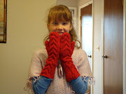 Cheyanne showing off her New Twilight Bella Mittens I made her.