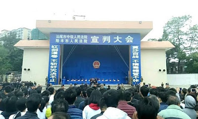 Residents in Guangdong invited to see group sentenced before they are taken away for summary execution in wake of drugs crackdown