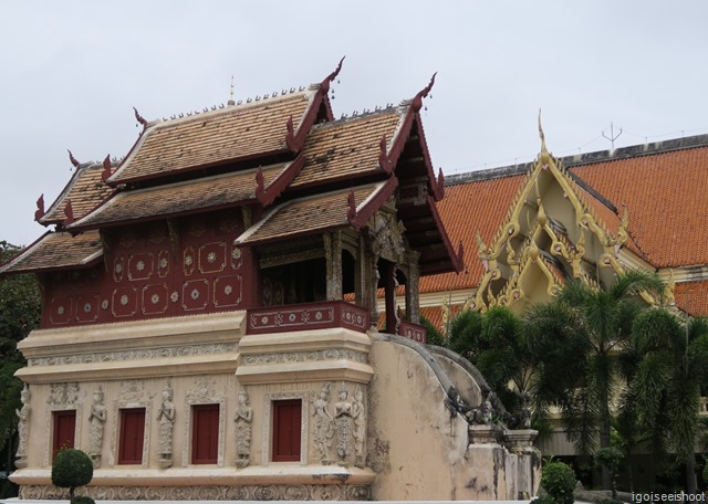 This small elaborate building next to the prayer hall is the library or scripture repository. It has a stone base to protect precious manuscripts from flooding and pest. Visit to Wat Phra Singh