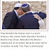 Pope hugging a Muslim Cleric and a Jewish priest