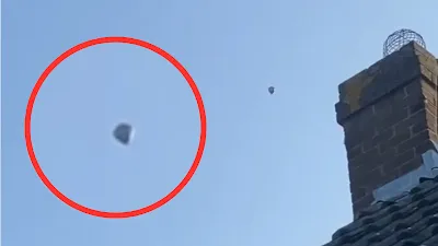 Silver UFO Orb filmed over Newcastle Upon Tyne near airport.