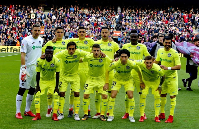 GETAFE C. F. Temporada 2017-18. Guaita, Arambarri, Fajr, Bruno, Djené, Ángel. Amath, Damián Suárez, Portillo, Gaku Shibasaki, Antunes. F. C. BARCELONA 0 GETAFE C. F. 0. Domingo 11/02/2018, 16:15 horas. Campeonato de Liga de 1ª División, jornada 23. Barcelona, Nou Camp: 75.681 espectadores. GOLES: No hubo.