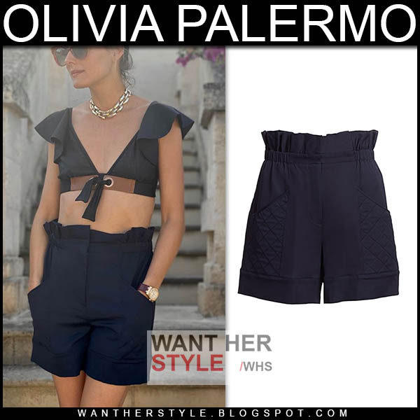 Olivia Palermo wearing black crop top and black paper bag shorts