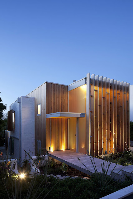 Glass Door, Wooden Wall with Decorative Lamps and Canopy