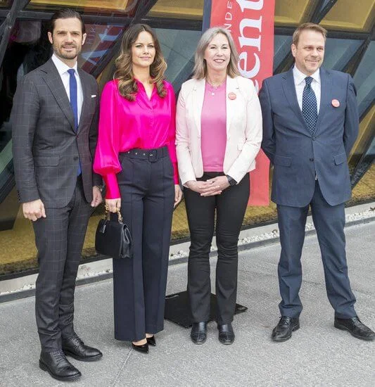 Princess Sofia wore a fuchsia Asta silk blouse shirt by Dea Kudibal. Neuropsychiatric Forum held at Aula Medica