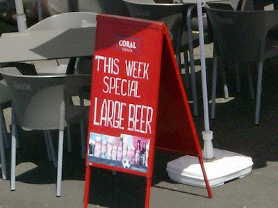 Sign in Funchal reading 'THIS WEEK SPECIAL  LARGE BEER'