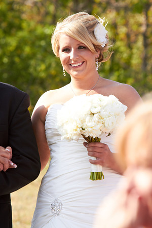 The bridesmaids carried bouquets of hydrangea pink peonies and ranunculus