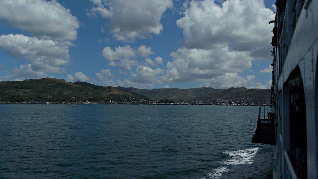 ship's side and a view of parts of Catbalogan City viewed from M/V Blessed Stars of Roble Shipping