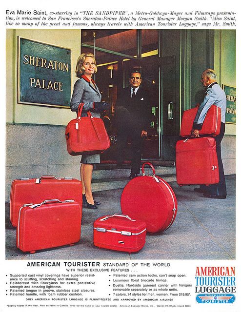 an American Tourister advertisement from 1965 featuring Eva Marie Saint, a popular actress of the time, smiling and sporting a full set of red tiara American Tourister luggage outside of the Sheraton Palace in San Francisco