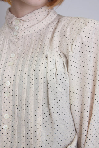 Above the rare to find vintage 1980s silk shirt by Emmanuelle Khanh 