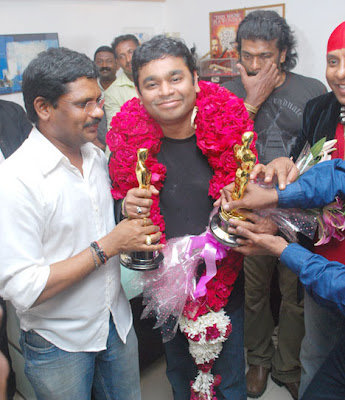 A R Rahman returned by an emirites filight to a rousing welcome at the Anna International Air Terminal after winning two oscars