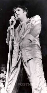 Elvis on stage in Toronto (Canada) with the legendary gold suit