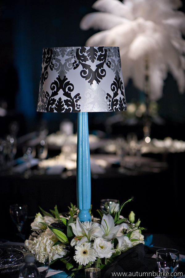 The round tables were set with the damask pattern lampshade centerpiece