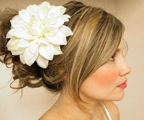 wedding updos with flower hair accessories