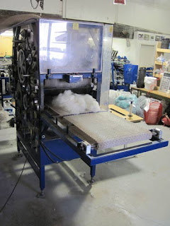 Machine for preparing alpaca wool.