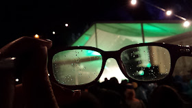 Watching a gig in pouring rain proves difficult for those with glasses