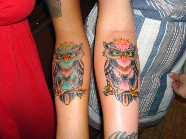 best friend tattoos for girls matching owls with different colors that look nice on forearms