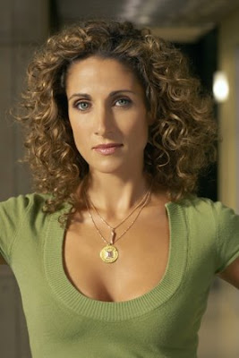 melina kanakaredes curly  hair style