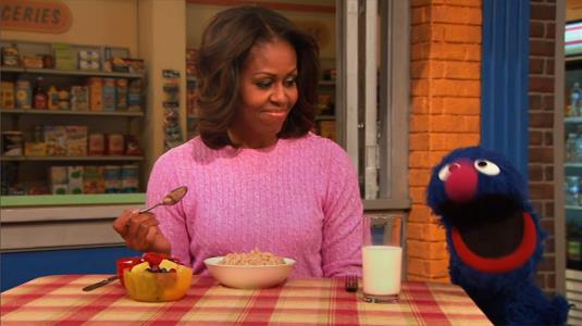 Sesame Street Episode 4521. Michelle Obama is having breakfast. Grover feels tired and Michelle Obama explains that he needs breakfast.