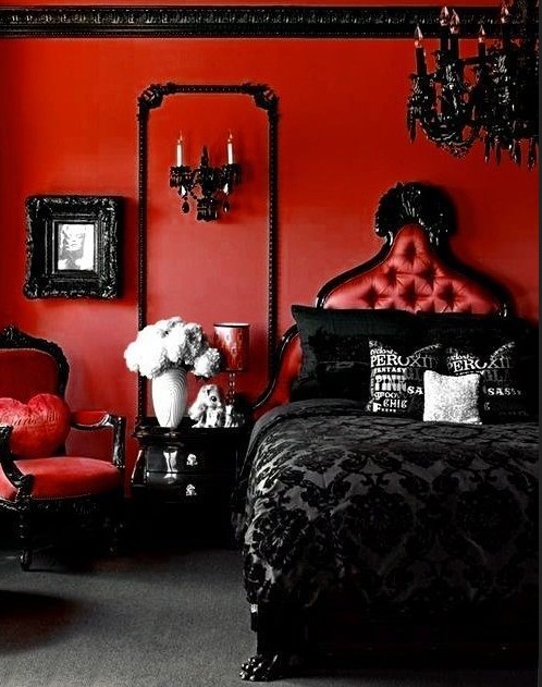 Dark Red accent wall in bedroom