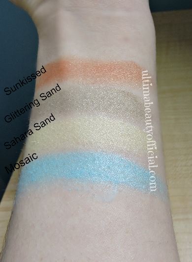 Swatches of Chic Eyeshadow Quad with text. Text reads: Sunkissed, Glittering Sand, Sahara Sand, Mosaic