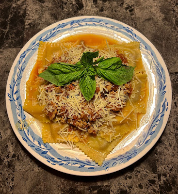 Tomato and burrata ravioli with homemade marinara and new Bolognese mix of ground veal, pork and beef