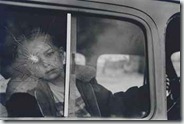 elliott_erwitt_child_at_broken_window_1969_d5515912h
