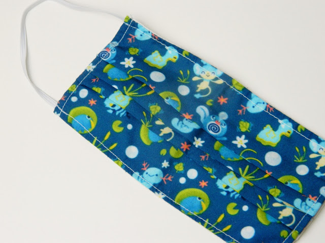 A photo showing a water type pokemon fabric mask