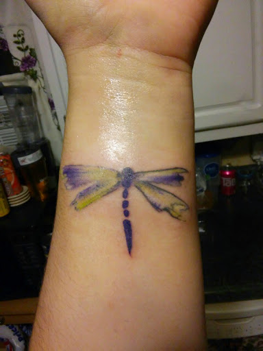 dragonfly tattoo means
