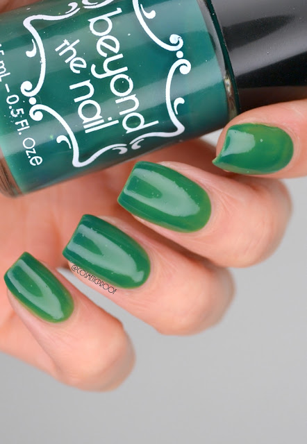 beyond the nail green thermal nail polish swatch holding bottle