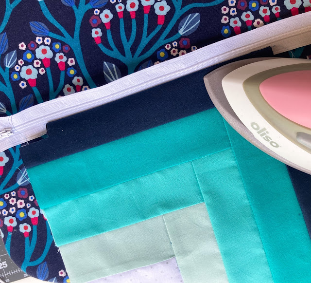 Install the zipper - Zipper Pouch Tutorial with Boxed corners - easy to sew zipper pouch