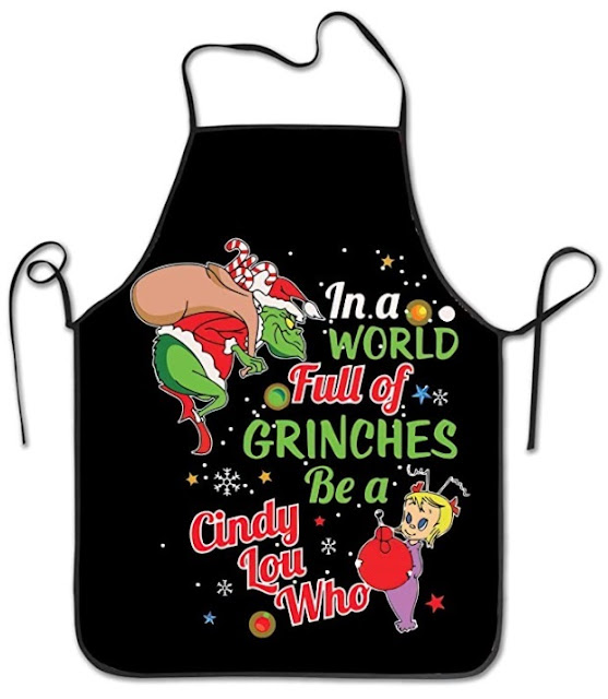 For fans of Dr. Seuss, a Christmas apron that reads, "In a world full of Grinches be a Cindy Lou Who."
