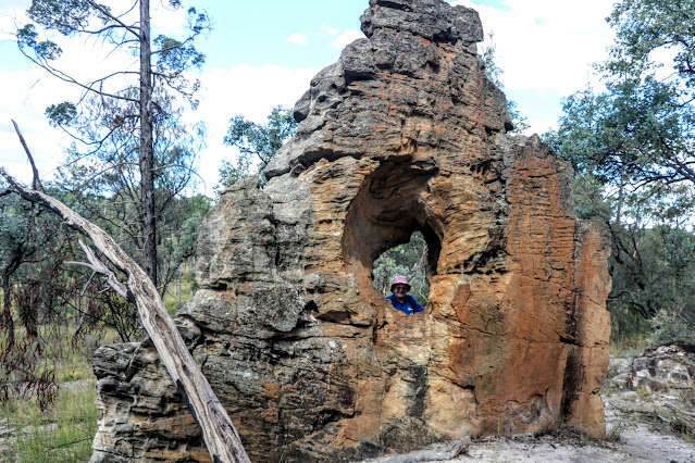 Dell peeking through "Looking Glass" rock formation