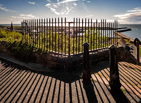 Photo of shadows cast by the railings at the top of Market Steps, Maryport