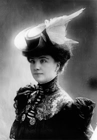 Kristin Holt | Madam, is that a duck on your hat? Vintage photograph, Victorian, showing a white feathered wint decorating a young woman's hat.